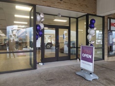 Front doors of Loyal Plaza connect center.
