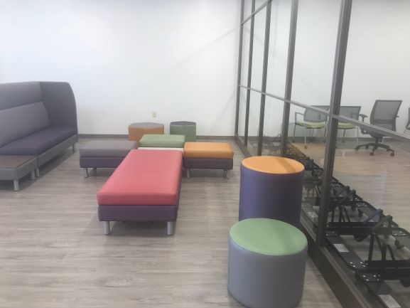 Loyal Plaza lobby interior with seating benches.