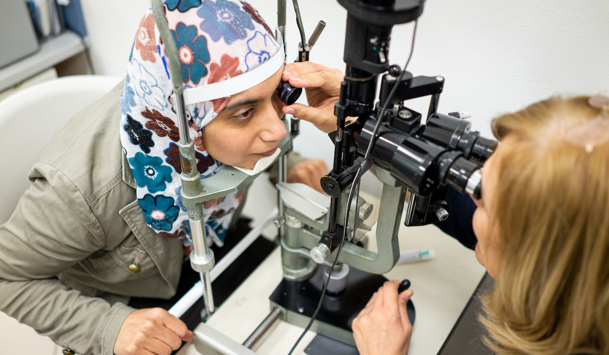 Woman receiving eye exam
