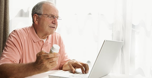 man using laptop